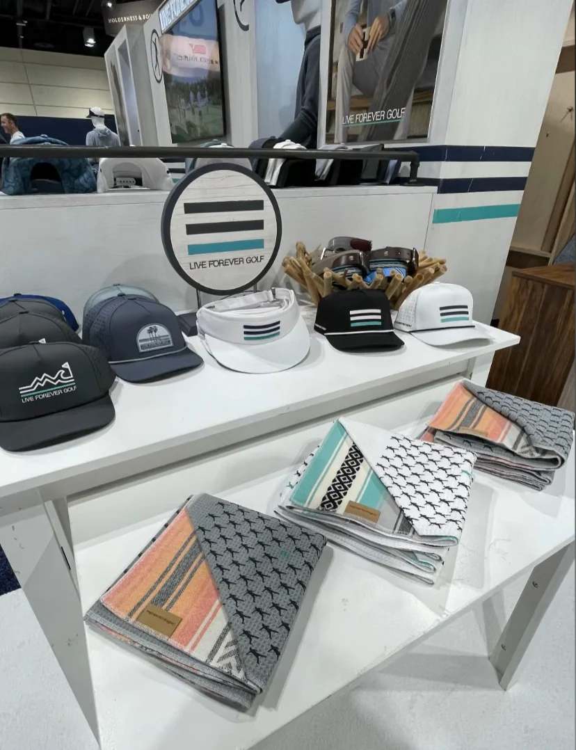 Custom Golf Towels on a Store Display Shelf