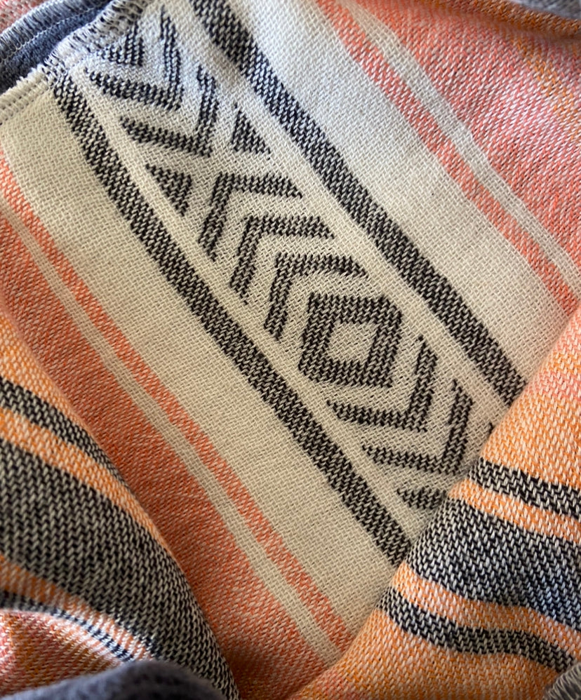 Close Up of Orange Baja Surf Patterned Golf Towel