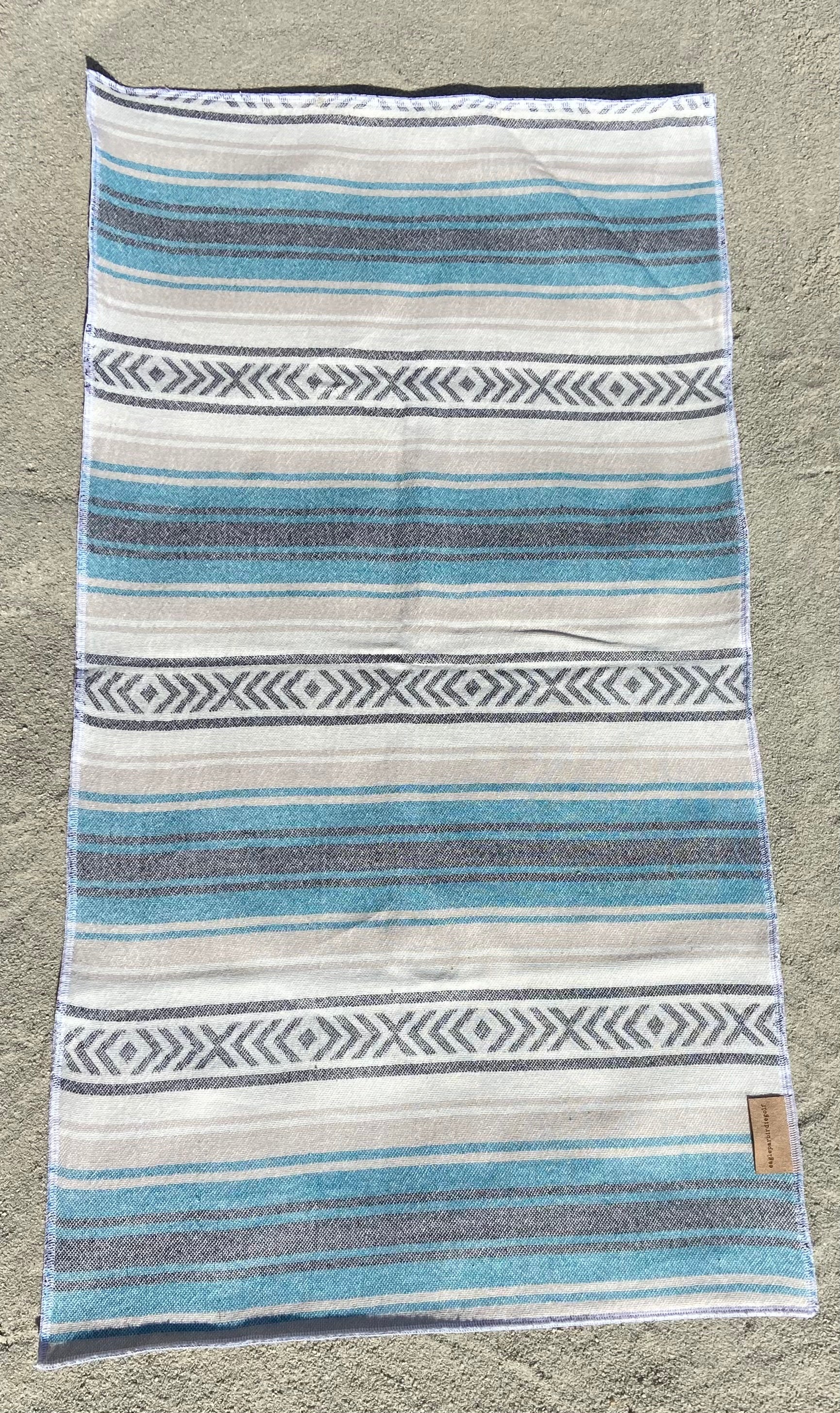 Teal Baja Surf Golf Towel on Sand