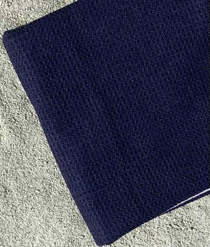 Black Textured Golf Caddy Towel on Sandy Beach