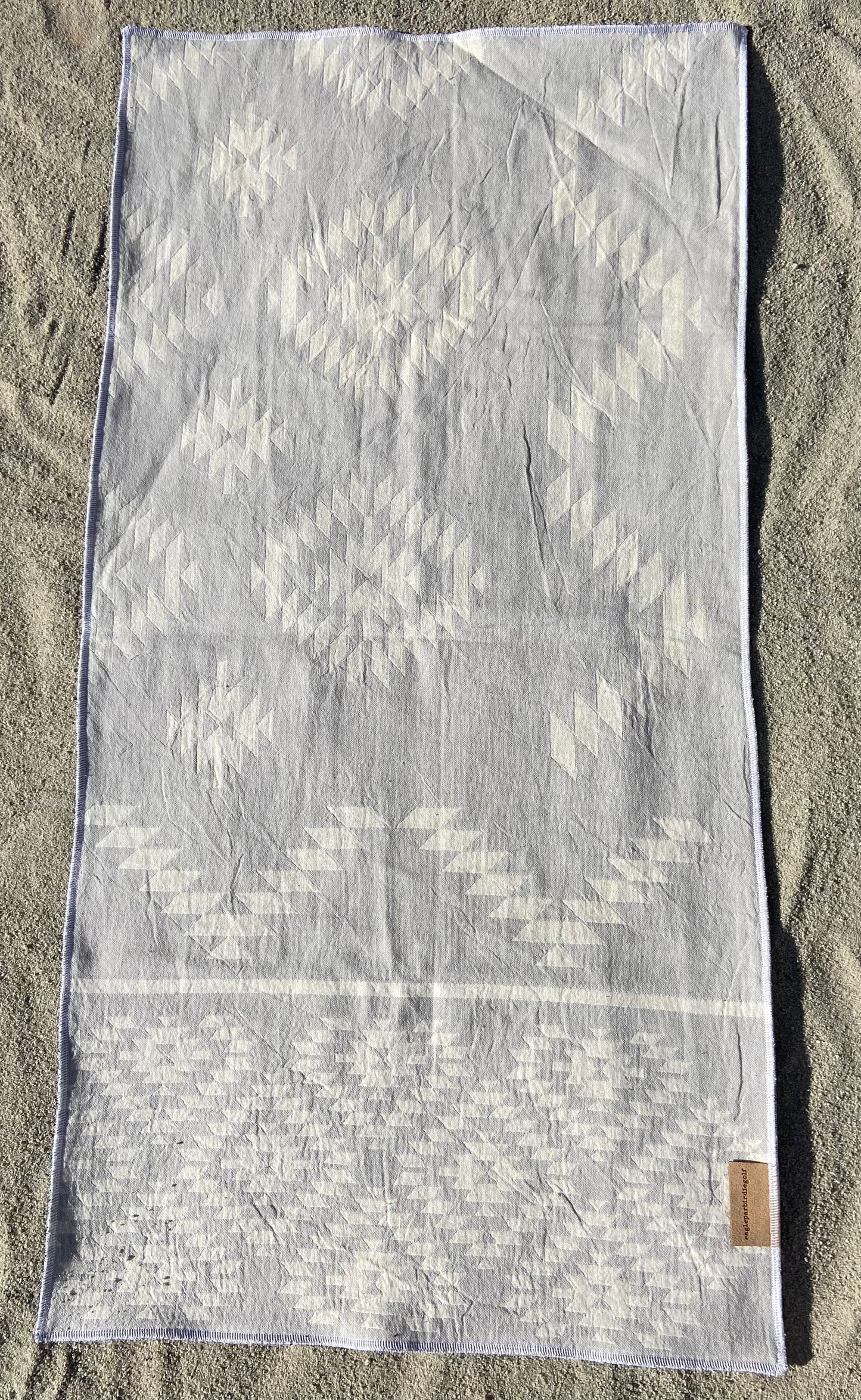 Large Gray Nav Surf Pattern Golf Caddy Towel on Sand