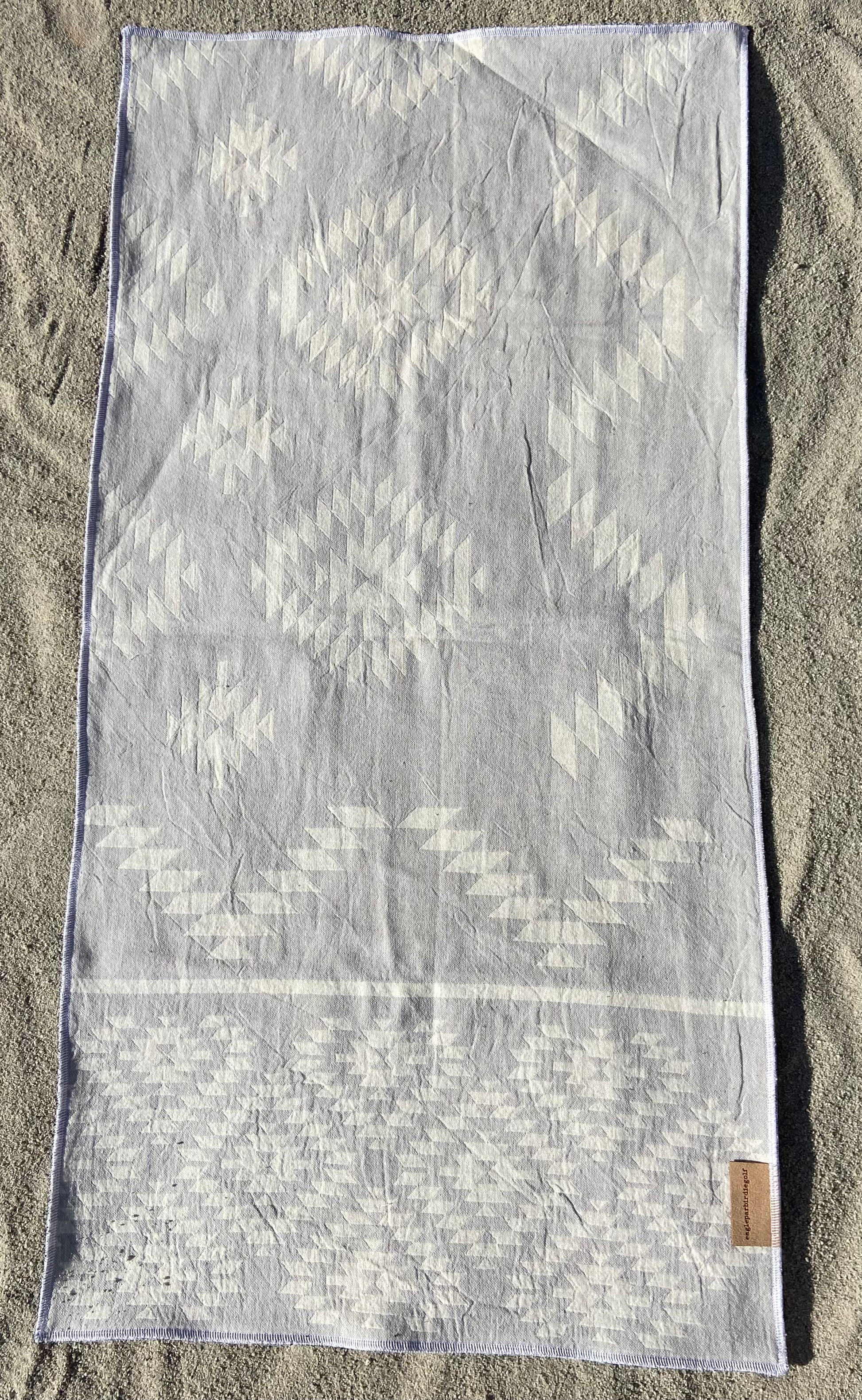 Large Gray Nav Surf Pattern Golf Caddy Towel on Sand
