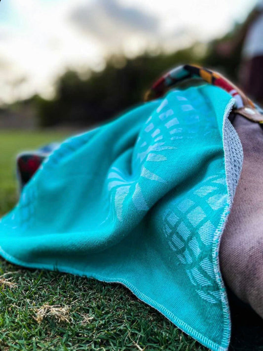 Teal Blue Hawaiian Golf Towel on Grass